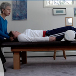 Feldenkrais Classes - student on table - aches and pains - child with special needs - vitality, mobility, and stability in aging - brain trauma